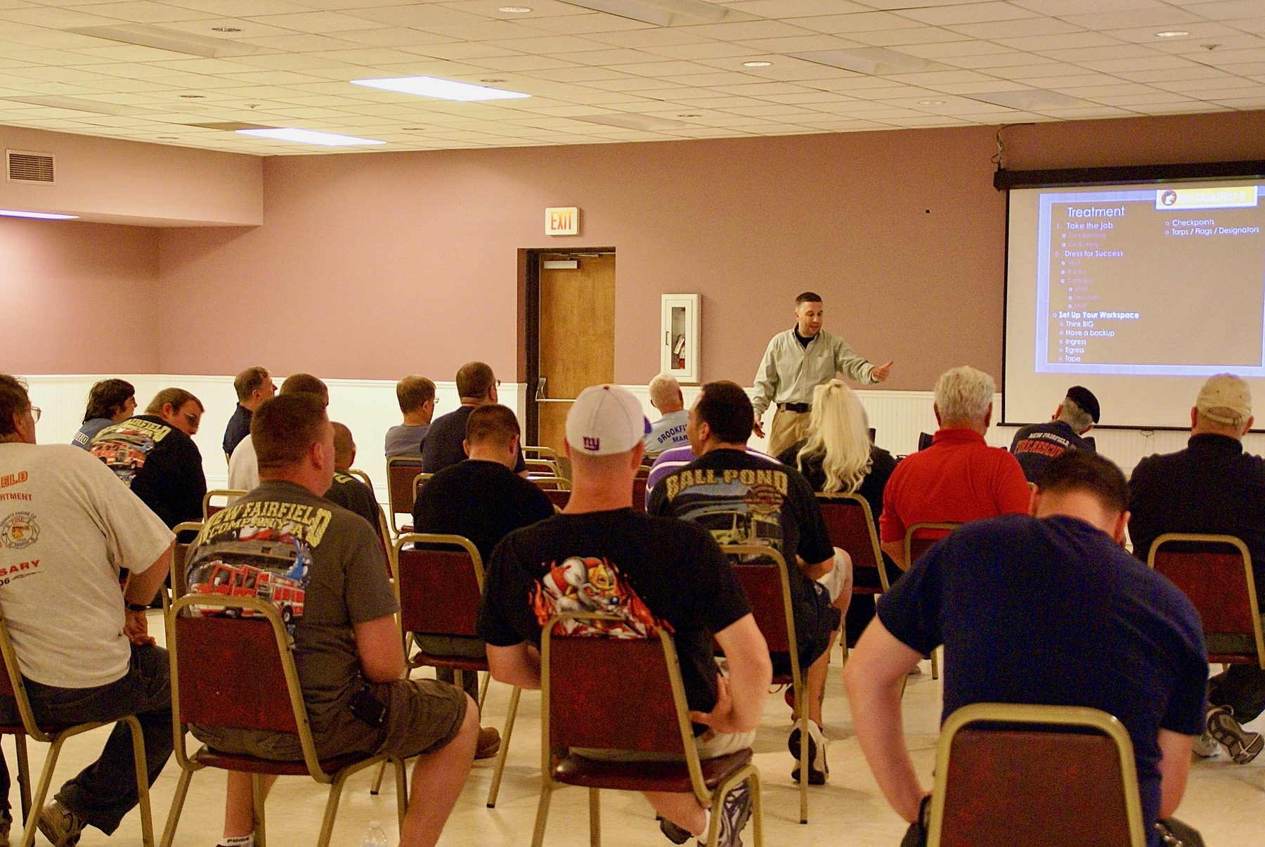 Rom Duckworth teaching a room of fire and EMS personnel.