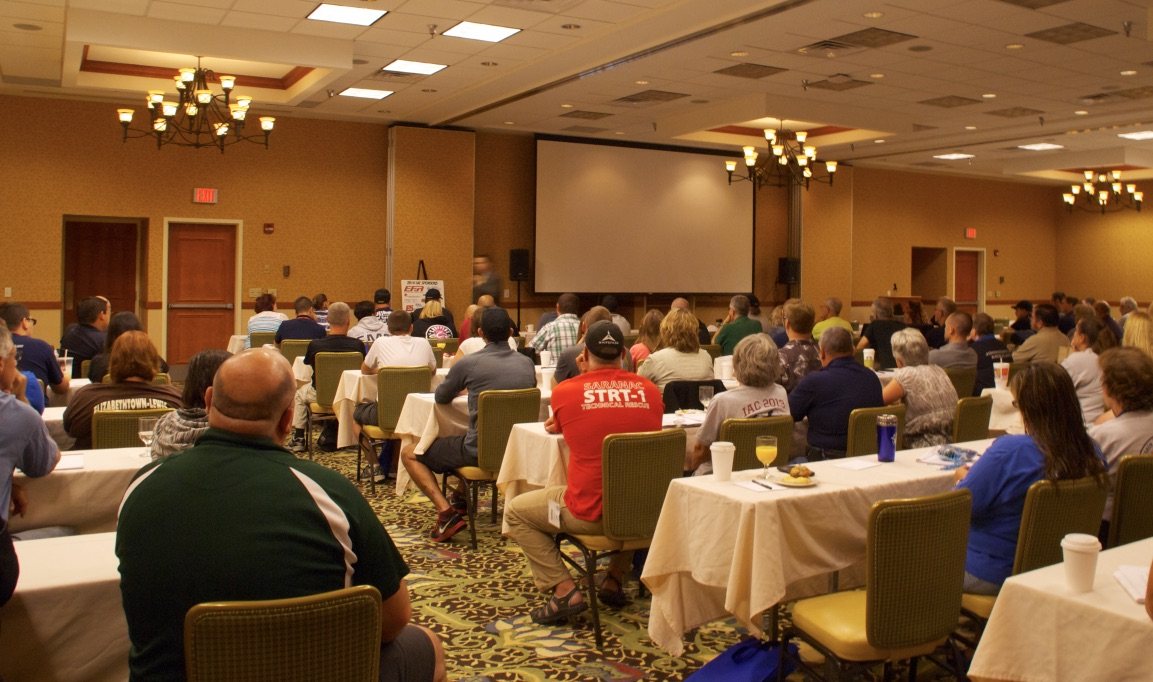 A full conference room during a session by Rom Duckworth at the Initial Assessment Conference in Lake Placid, New York.